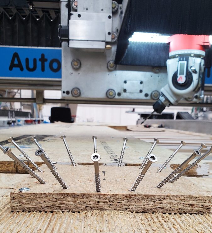 Angled drilling demo: screws set at many angles in one piece